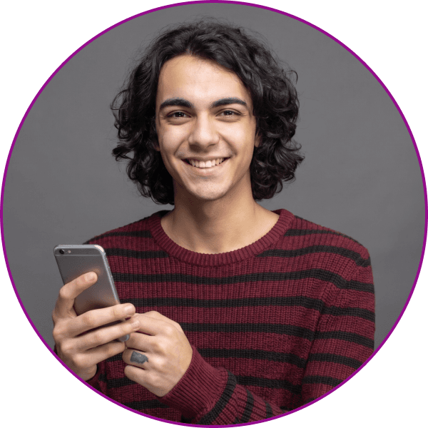 A satisfied customer smiling at their phone
